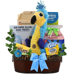 This Gift Includes:
For the Owner:
Strawberry Lime Drink Mix (Approx. two 8oz. Servings)
Fun Sized Candy (Peanut M&M's Shown)
Two (2) Oreo Packs (Oreo Mini's Bag and Golden Ordo 2 Cookie Pack Shown)
For The Dog:
Cassidy's Gourmet Biscuit Mix 14 oz.
Bone Shaped Cookie Cutter
Tummy Treats All Natural Salmon Dog Treats 12 oz.
Air-Dried Bison Dog Treats 2.5 oz.
Absurd Burds Blue Macaw Dog Toy 13.8" x 5.9"
Scroll Oval Metal Container
Gift Size 13.5" x 8.25" x 13"
Dim Wt: 18 lbs (15x15x11)