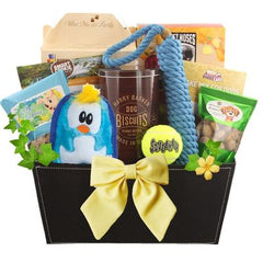 This Gift Includes:
Cassidy's Gourmet Biscuit Mix 14 oz.
Bone Shaped Cookie Cutter
Moments Apple Ginger Bears 14 oz.
Rabbit and Pumpkin Dog Treats 5 oz.
Puppy Cake Banana Premium Cake Mix and Frosting
Lucky Lickers Pumpkin with Cranberry Dog Treats 5 oz.
Clubhouse Peanut Butter Biscuits Tin 12 oz.
Invincible Penguin Plush Dog Toy 6.25" x 5"
Captains Bell Rope Toy 1.75 x 14
Kong SqueakAir Tennis ball
Large Black Faux Leather Embossed Container
Gift Size 14" X 8" X 16"
Dim Weight 15 lbs. (15x15x11)