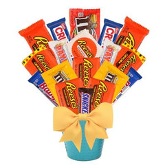 Bouquet Details:
Bouquet includes 15-16 Pieces of Candy
An assortment of Full Size and Fun Size candies
Gift Size 12" x 10" x 16"
Dim Weight 16 lbs. (21x13x9)