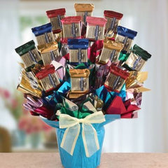 Bouquet Details:
Bouquet includes 15-16 Pieces of Candy
An assortment of flavors
Gift Size 12" x 10" x 16"
Dim Weight 16 lbs. (21x13x9)
