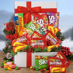 This Gift Includes:
Movie Style Skittles
Three (3) Skittles Full Size - variety of:
Original Fruit Skittles
Tropical Skittles
Wild Berry Skittles
Crazy Cores Skittles
Tart-N-Tangy Skittles
Sour Skittles
Starburst Original
Starburst Tropical
Ten (10) Fun Size Skittles - variety of:
Original Fruit Skittles
Tropical Skittles
Wild Berry Skittles
Crazy Cores Skittles
Tart-N-Tangy Skittles
Sour Skittles
Starburst Original
Starburst Tropical
Decorative packaging
Gift Size 8” x 8” x 3”
Dim Weight 2 lbs. (9"x9"x4")