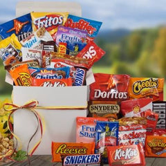 This Gift Includes:
Assorted Chips (ex: Doritos, Fritos, Chips)
Assorted Candies (ex: Reeses, M&M's, Snickers)
Assorted Snacks (ex. Milano's, Chocolate Chip Cookies)
White Gloss Gift Box (8.5" X 8.5" X 8.5")
Dim Weight 12 lbs. (11x11x13)